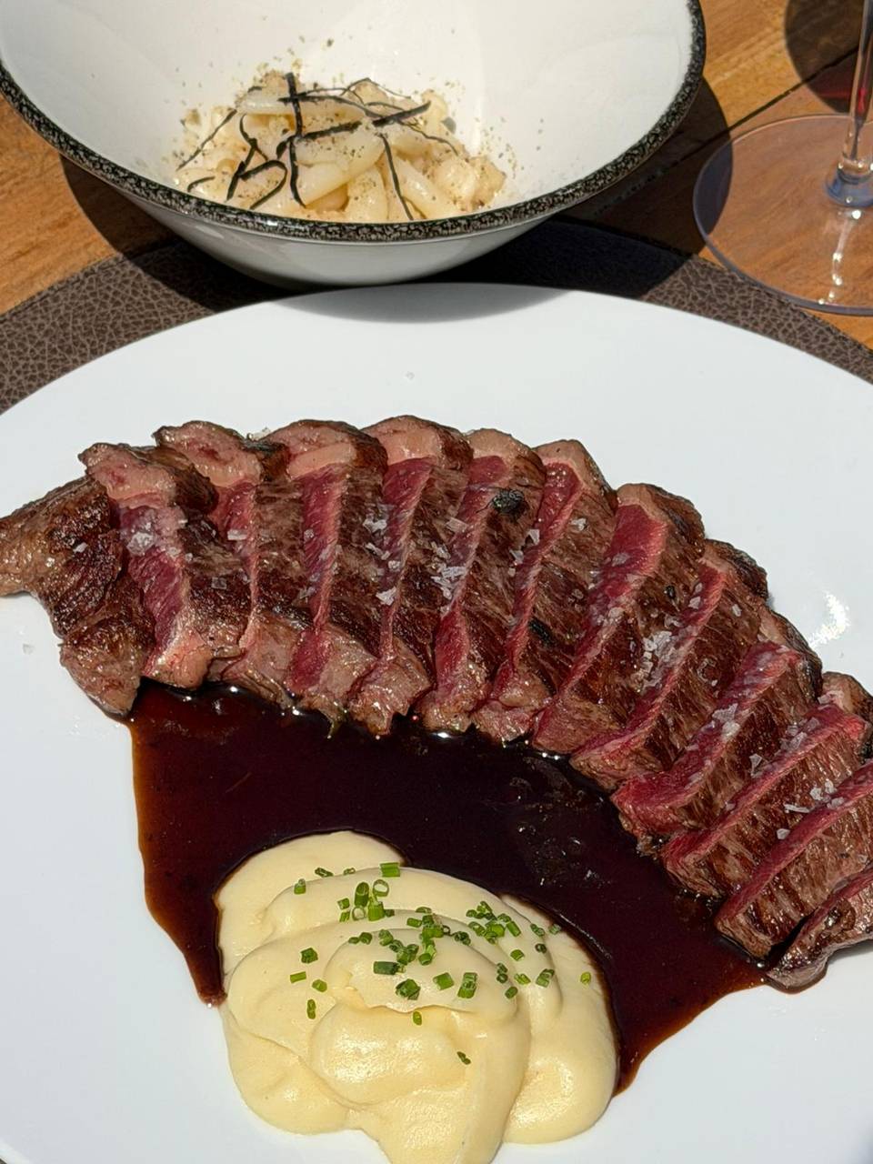 Image 2 - 60-day aged picanha with parmesan, pickled shimeji mushrooms, and wasabi